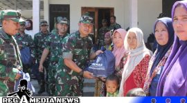 Caption: penyerahan bansos berupa paket sembako kepada warga di lokasi TMMD ke-117, (dok. regamedianews). 