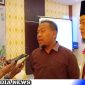 Caption: Kepala Departemen Gadai Area Pamekasan H.Purwanto, saat diwawancara awak media, usai seminar pembiayaan haji, (dok. regamedianews). 