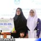 Caption: BPJS Ketenagakerjaan secara simbolis serahkan santunan dan beasiswa kepada ahli waris, (dok. BPJS). 