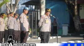 Caption: Irwasda Polda Gorontalo Kombes Pol Edward P. Sirait, saat pimpin apel siaga, (dok. regamedianews). 