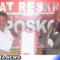 Caption: Hadi Umar didampingi Kuasa Hukumnya, Rio Potale,SH., MH., saat melaporkan Kepala Desa Datahu ke Polres Gorontalo, Kamis (14/09/2023).