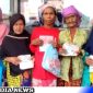 Caption: beberapa warga penerima setelah mencairkan BLT DD di Bank Sampang KCP Kedungdung, (dok. regamedianews). 