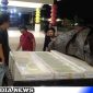 Caption: Satresnarkoba Polres Gorut geledah mobil berisi ratusan liter miras cap tikus, (dok. regamedianews.com). 