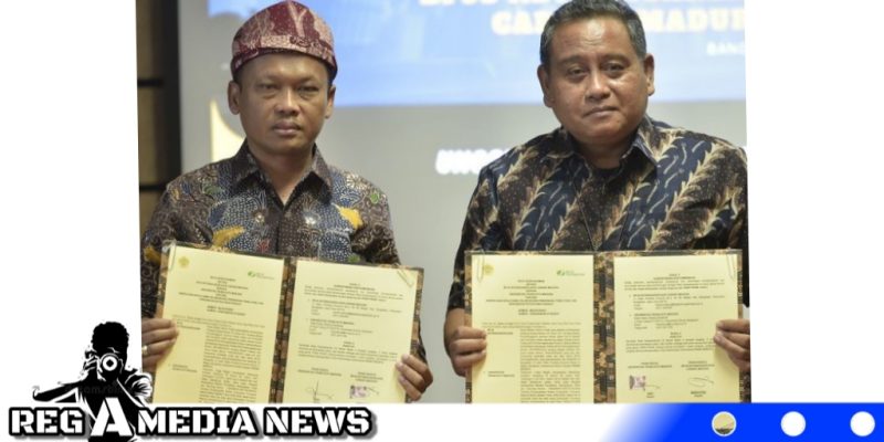 Caption: Penandatanganan Nota Kesepahaman diteken langsung oleh Rektor UTM Dr. Safi' dan Kepala BPJS Ketenagakerjaan Madura, Indriyatno. (Dok. Humas).