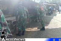 Caption: personel TNI sebelum melaksanakan kegiatan bersih-bersih sampah Pasar Tradisional Moluo, (dok. regamedianews). 