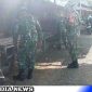Caption: personel TNI sebelum melaksanakan kegiatan bersih-bersih sampah Pasar Tradisional Moluo, (dok. regamedianews). 