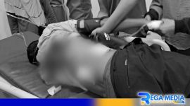 Caption: korban tampak mengalami dua luka tembak dibagian punggung, (dok. regamedianews). 