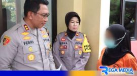 Caption: Kapolres Bangkalan bersama RB terduga pelaku pembuangan bayi, (dok. regmedianews). 