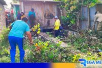Caption: Tagana Kota Gorontalo saat kerja bakti di Kelurahan Ipilo, Kecamatan Kota Timur, Kota Gorontalo, (dok. regamedianews). 