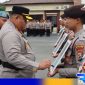 Caption: AKBP Jazuli Dani Iriawan usai pimpin upacara PTDH tiga anggota Polres Pamekasan, (dok. regamedianews). 