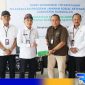 Caption: Sekda Bangkalan pose bersama Kepala BPJS Ketenagakerjaan Madura, (dok. regamedianews). 