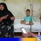 Caption: pasien dan neneknya saat ditemui awak media, di Puskesmas Kamoning Sampang, (dok. regamedianews). 
