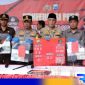 Caption: Forkopimda Bangkalan tunjukkan barang bukti kasus kriminal dan narkoba yang diungkap Polres Bangkalan, (dok. regamedianews). 
