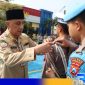 Caption: PJ Bupati Bangkalan Arief M.Edie cek kesiapan personel saat apel gelar pasukan Operasi Ketupat Semeru 2024, (dok. regamedianews). 