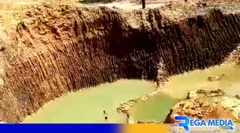 Caption: tampak lokasi tambang galian C di Desa Angsanah mulai digenangi air, (dok. regamedianews). 