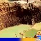 Caption: tampak lokasi tambang galian C di Desa Angsanah mulai digenangi air, (dok. regamedianews). 