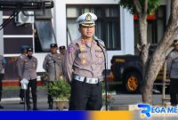 Caption, Dirlantas Polda Gorontalo saat pimpin apel personel gabungan, (dok. regamedianews). 