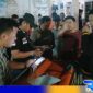 Caption: anggota kepolisian saat melakukan identifikasi di TKP seorang wanita ditemukan tewas, (dok. regamedianews). 