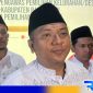 Caption: Ketua Bawaslu Bangkalan Ahmad Mustain Saleh saat diwawancara, (dok. regamedianews). 