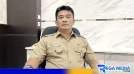 Caption: Plt Kepala Dinas Pemberdayaan Masyarakat dan Desa (DPMD) Bangkalan, Rudiyanto, (dok. regamedianews). 