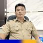 Caption: Plt Kepala Dinas Pemberdayaan Masyarakat dan Desa (DPMD) Bangkalan, Rudiyanto, (dok. regamedianews). 