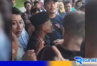 Caption: screenshot video viral, remaja berpeci hitam tampak dikerumuni warga, (dok. regamedianews). 