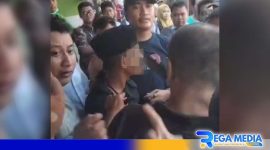 Caption: screenshot video viral, remaja berpeci hitam tampak dikerumuni warga, (dok. regamedianews). 
