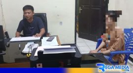 Caption: pelaku penggelapan laptop inisial NPP saat diamankan di Mapolsek Dungingi, (dok. regamedianews). 