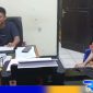 Caption: pelaku penggelapan laptop inisial NPP saat diamankan di Mapolsek Dungingi, (dok. regamedianews). 