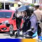 Caption: Kasatgas Gakkum Ditlantas Polda Gorontalo saat gelar Operasi Patuh 2024, (dok. regamedianews). 