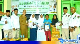 Caption: Baznas Gorut serahkan bantuan alat tulis sekolah kepada anak yatim secara simbolis, (dok. regamedianews). 