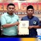 Caption: penyerahan berkas persyaratan Cabup-Cawabup Sampang oleh tim Parpol pengusung paslon JIMAD Sakteh ke KPU Sampang. 
