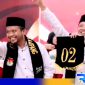 Caption: senyum sumringah pasangan Cabup-Cawabup Sampang (Aba Idi - Ra Mahfud) tunjukkan nomor urut 02, (dok. regamedianews). 