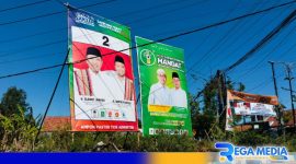 Caption: berdiri tegak APK paslon Jimad Sakteh berdampingan dengan APK paslon Mandat, (dok. regamedianews). 