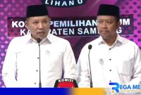 Caption: Cabup dan Cawabup Sampang 02, H.Slamet Junaidi - Ra Mahfud saat debat publik perdana di Surabaya, (dok. regamedianews). 