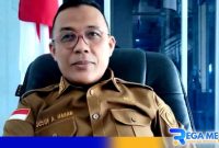 Caption: Camat Anggrek (Yusuf Abdullah Hasan). 