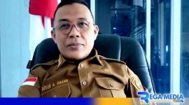 Caption: Camat Anggrek (Yusuf Abdullah Hasan). 