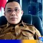 Caption: Camat Anggrek (Yusuf Abdullah Hasan). 
