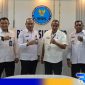 Caption: Kalapas Narkotika Kelas IIA Pamekasan dan Kalapas Pamekasan pose bersama dengan Kepala BNNK Sumenep. 