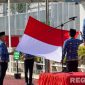 Caption: berlangsungnya upacara Harkitnas ke-117 di halaman kantor Lapas Narkotika Kelas II Pamekasan. 