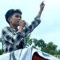 Caption: David Ahmad aktivis Gorontalo Utara saat berorasi ketika aksi demonstrasi, (dok. regamedianews). 