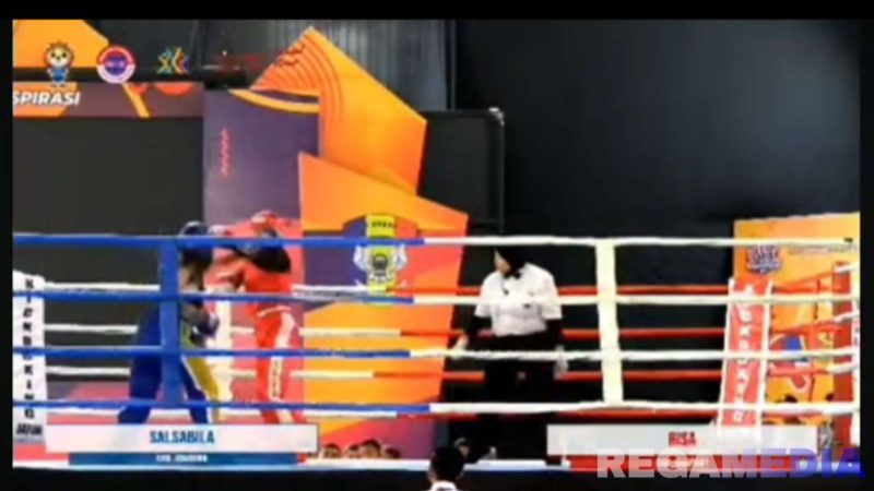 Caption: potongan video, berlangsungnya pertandingan atlet KONI Sampang cabor kickboxing diajang Porprov Jatim 2025, (dok. regamedianews). 