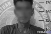 Caption: tersangka kasus narkoba inisial MA saat diamankan di ruang Satresnarkoba Polres Sumenep. 