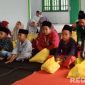 Caption: potret sejumlah anak yatim setelah menerima santunan dari LAZISNU MWCNU Omben, Sampang, (dok. regamedianews). 