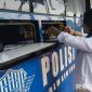 Caption: uji coba Layanan SIM Keliling di sekitar Alun-Alun Trunojoyo Sampang oleh Satpas Satlantas Polres Sampang, (dok. regamedianews). 