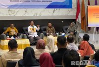 Caption: Bupati Gorontalo Utara Thariq Modanggu, tengah memaparkan Agenda 100 Hari Kerja Pemerintahan 