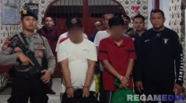 Caption: sejumlah narapidana Lapas Pamekasan dikawal ketat petugas lapas dan polisi, saat hendak dimutasi ke Lapas lain, (dok. regamedianews). 