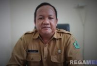 Caption: Kepala Dinas Koperasi, Usaha Mikro Kecil Menengah dan Ketenagakerjaan Kabupaten Pamekasan, Muttaqin, (dok. regamedianews). 