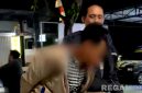 Caption: inisial MA, pelaku pencurian kotak amal masjid, saat digelandang polisi ke Mako Polsek Sokobanah, (dok. regamedianews). 