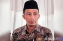 Caption: Kepala Dinas PUPR Kabupaten Pamekasan, Amin Jabir, (dok. regamedianews). 